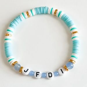 “J F D I” Peloton stretch bracelet